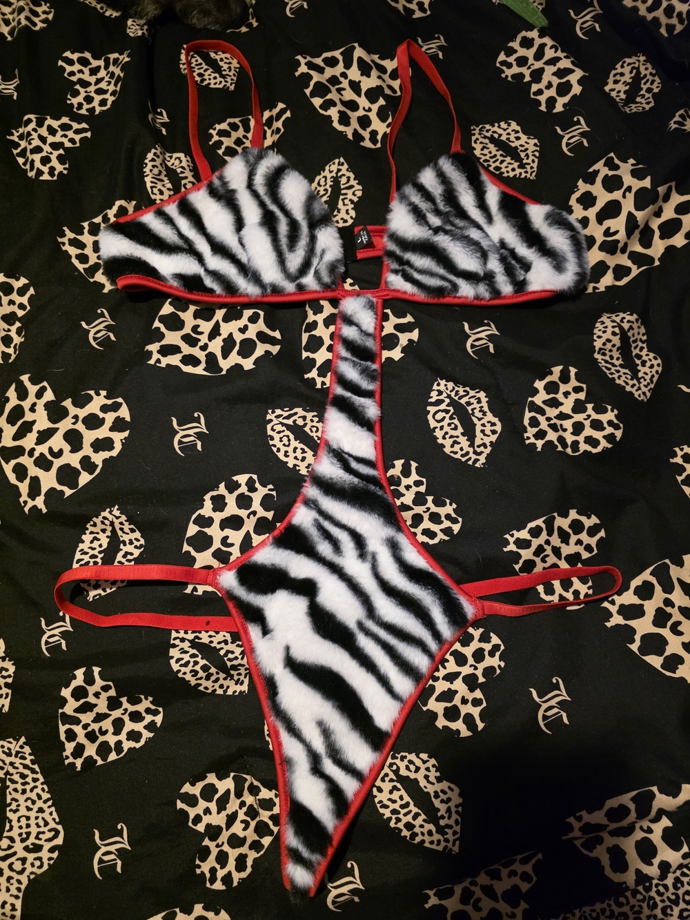 Zebra Print Faux Fur Women’s Bodysuit with Red Trim